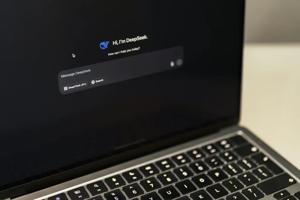 A MacBook displaying the DeepSeek AI interface, showcasing digital innovation.